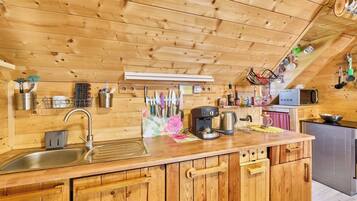 Wood, Kitchen, Countertop, Furniture, Home, Wood Stain, Cottage, Log Cabin, Kitchen Appliance, Major Appliance