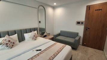 Family Double Room, City View | Laptop workspace, iron/ironing board, free WiFi