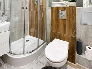 Apartamento | Banheiro | Secador de cabelo, toalhas de banho