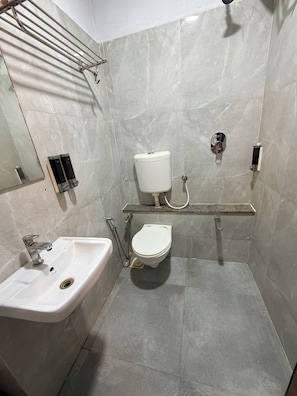 Deluxe Double Room, City View | Bathroom | Slippers, towels, soap, shampoo - HOTEL MARUTI R FAMILY PRIME  (South Bopal, Bopal,)
