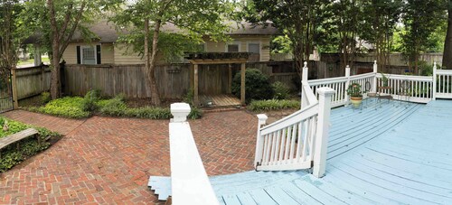 Porch swing, 1920s home, walk to live music