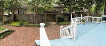 Porch swing, 1920s home, walk to live music