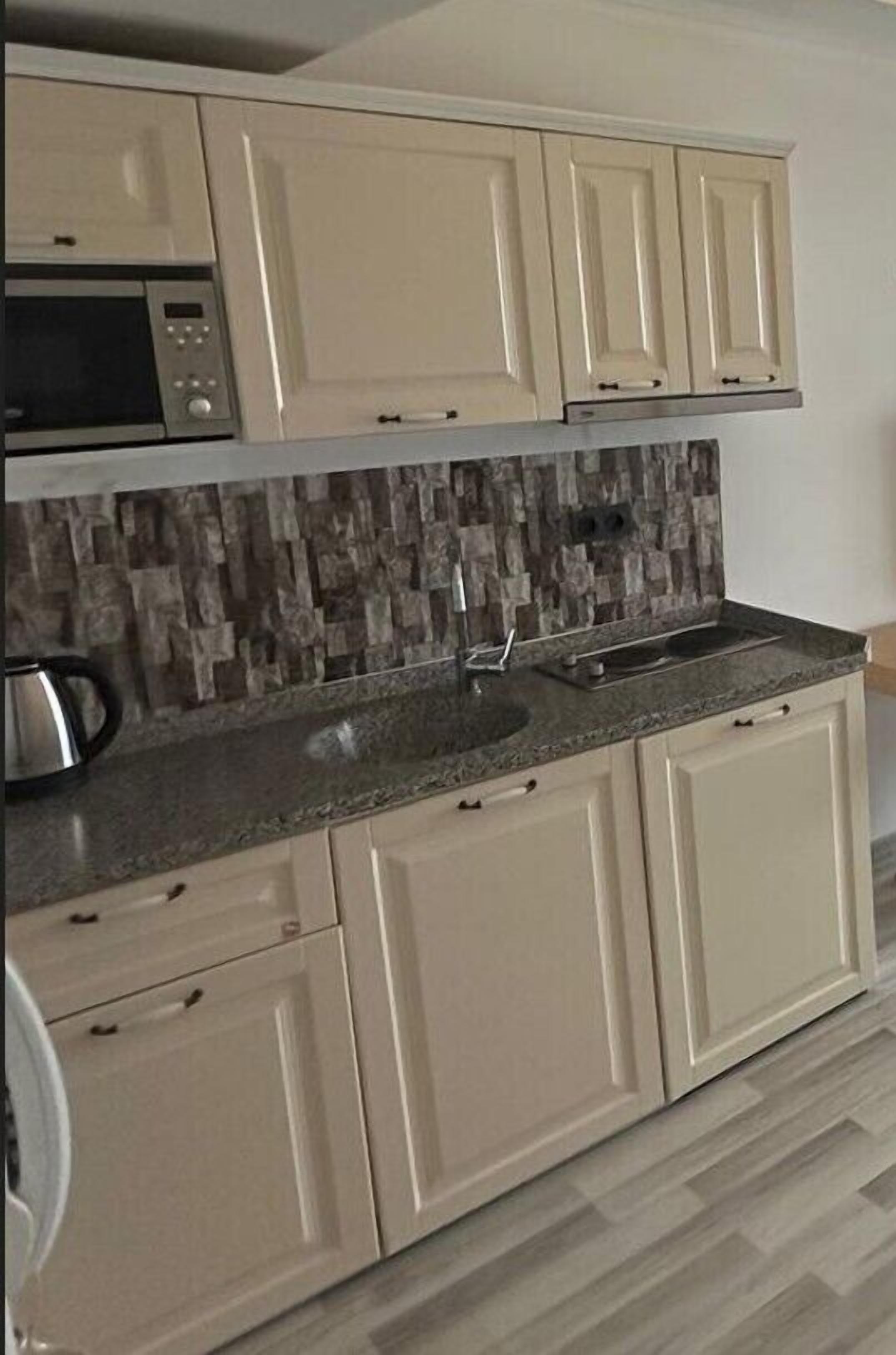 Suite Confort, balcón, vistas al mar | Cocina privada | Frigorífico pequeño