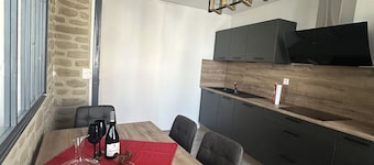 Wine-themed apartment—in the center of Tain l'Hermitage with a large garage.