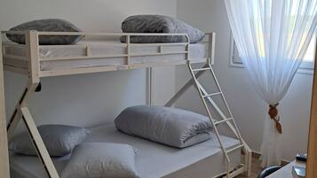 2 bedrooms, desk, iron/ironing board, travel crib