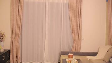 Family Apartment, City View | Living area