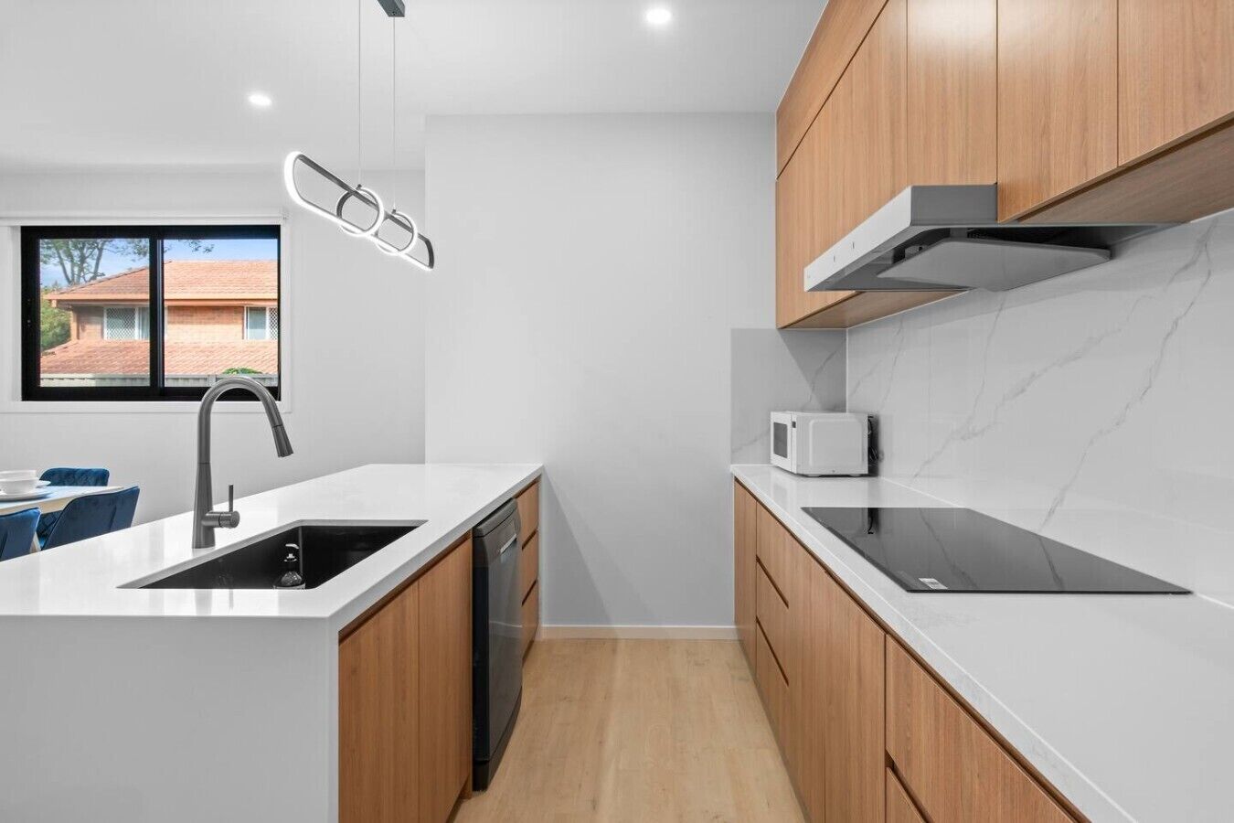 Fridge, dishwasher, cookware/dishes/utensils, dining table