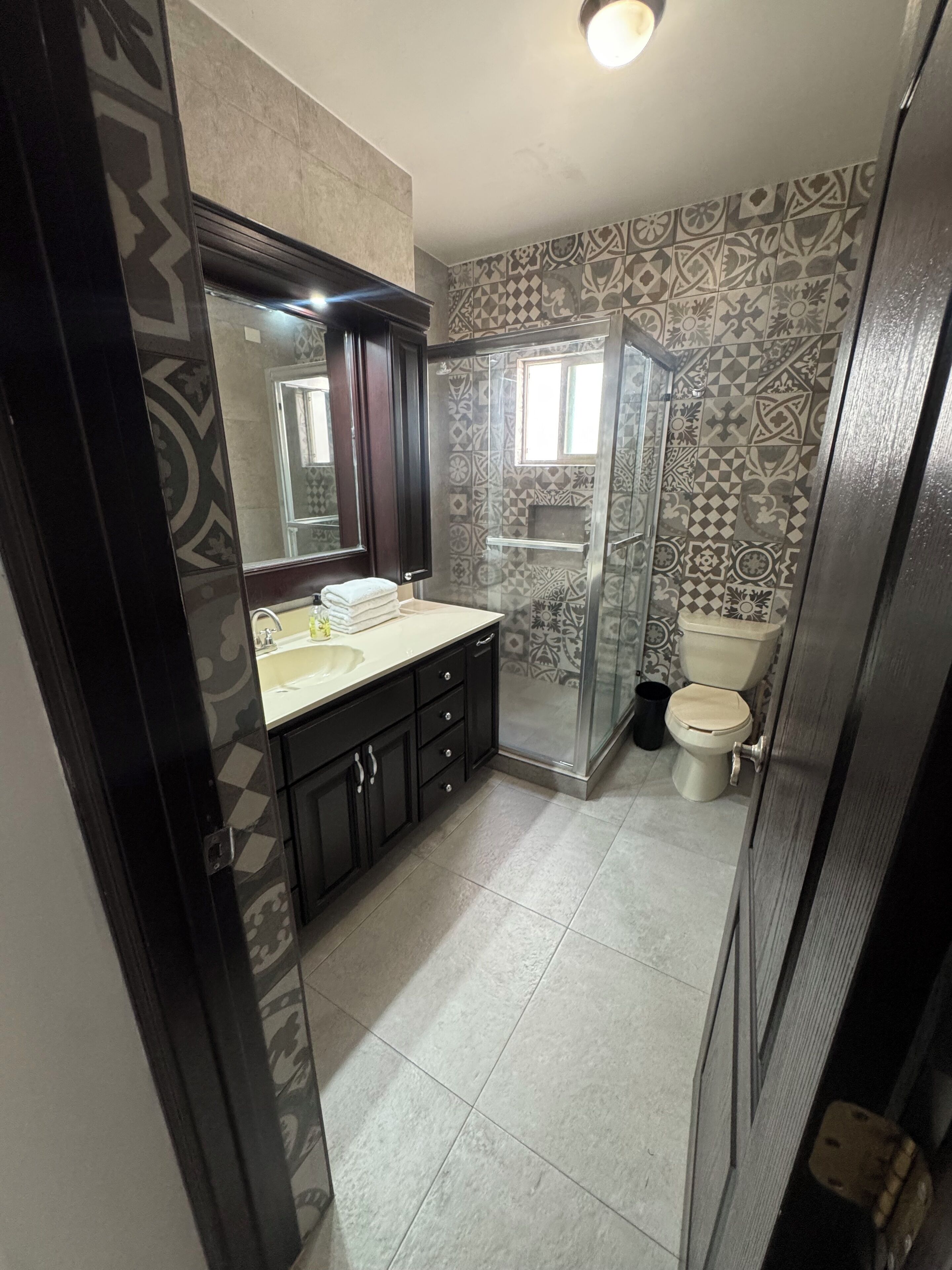 Shower, towels, soap, toilet paper
