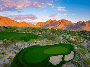 A golf course with a mountainous backdrop and a clear sky. - Brand-New, Spacious Desert Oasis - Pool, Spa & Mountain Views (La Quinta)