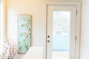 A white door with a view of a tree outside. - Luxy-Master BRD Down - 7Beds - Near CLT Uptown (Charlotte)