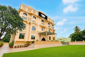 A large, multi-story building with a sign indicating 'PALETTE 3.0 Pro-Serviced' on the facade. - Classic Palette Hotel and Resort (Cuttack)