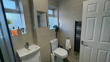 Hair dryer, towels, soap, toilet paper
