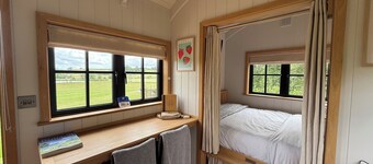 The Black Swan Shepherds Hut overlooking private lakes