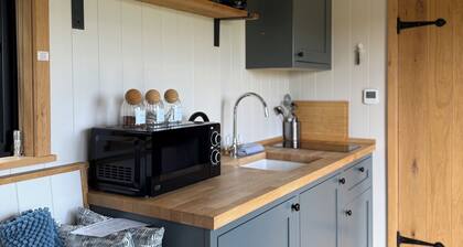The Black Swan Shepherds Hut overlooking private lakes
