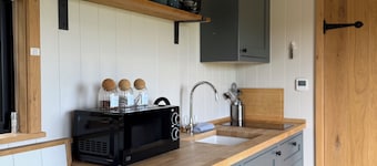 The Black Swan Shepherds Hut overlooking private lakes