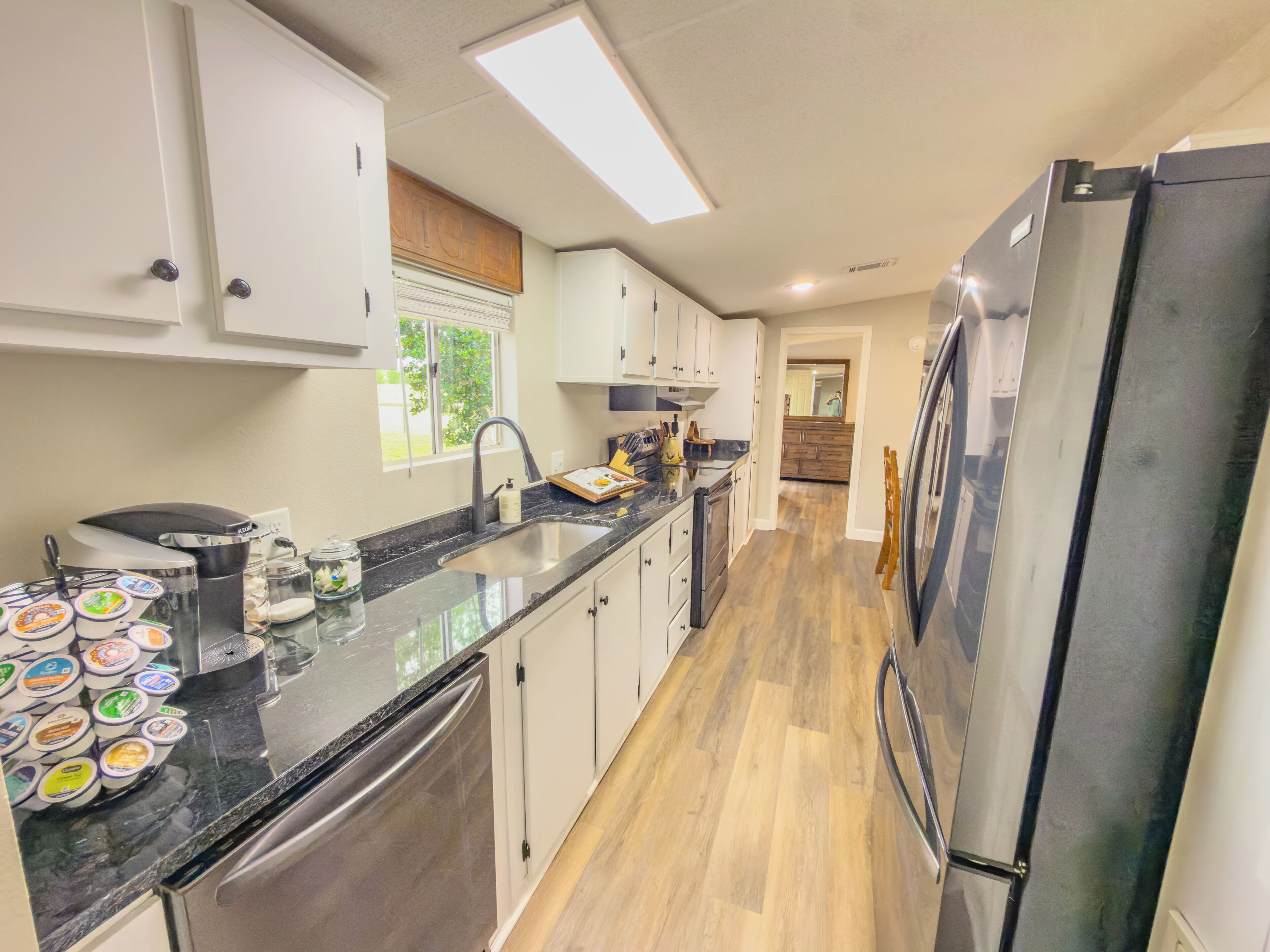 Coffee/tea maker, fridge, microwave, oven