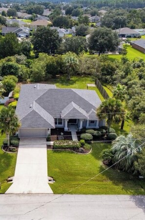 Exterior -
Tropical Serenity Stay: A Florida Oasis Minutes from Beaches & St. Augustine (Palm Coast)