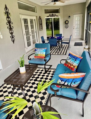 Outdoor dining -
Tropical Serenity Stay: A Florida Oasis Minutes from Beaches & St. Augustine (Palm Coast)
