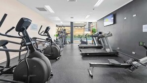 A gym with treadmills, stationary bikes, and elliptical machines. - Heart of the CBD ~ 1bed/1bath/balcony/free Parking (Brisbane)