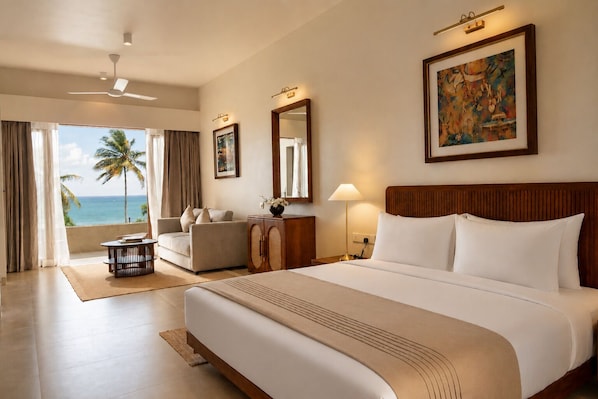 Habitación doble Deluxe, balcón, vista a la playa | Escritorio, espacio para trabajar con laptop y wifi gratis