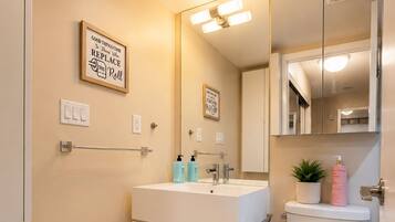 Hair dryer, towels, soap, shampoo