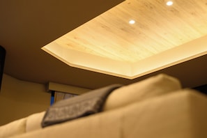 A ceiling with a wooden panel design and recessed lighting. - HOTELA Niseko Towers  (Kutchan)