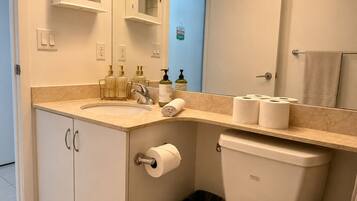 Hair dryer, towels, soap, shampoo