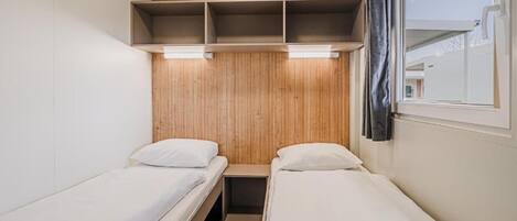 บ้านพัก, 3 ห้องนอน, เครื่องปรับอากาศ, วิวสวน | Wi-Fi ฟรี, ผ้าปูที่นอน