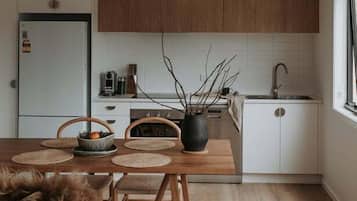 Coffee/tea maker, fridge, microwave, oven