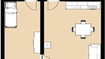 Un plan d’aménagement de chambre d’hôtel comprenant un lit, un bureau, une chaise, une petite table et une fenêtre.