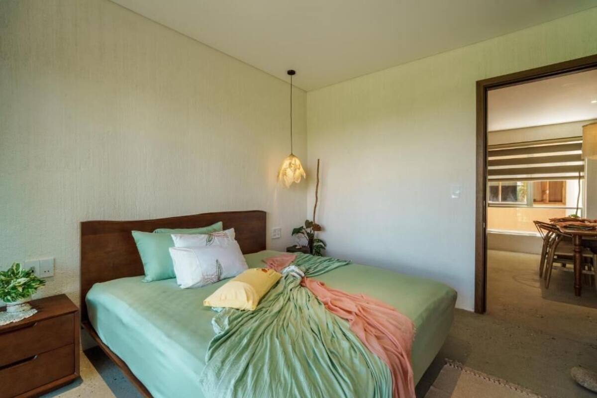 Premium bedding, blackout curtains, soundproofing, iron/ironing board