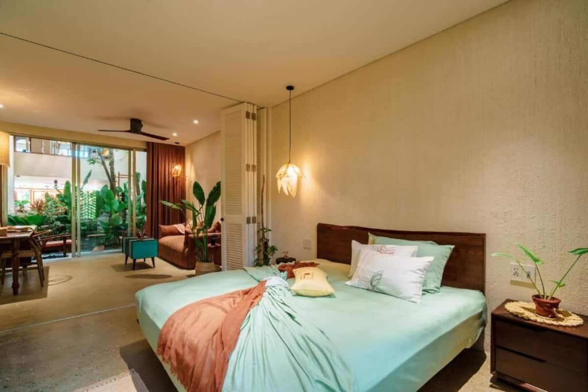 Premium bedding, blackout curtains, soundproofing, iron/ironing board