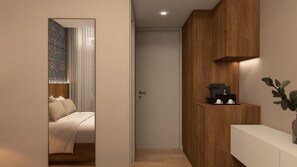 A hotel room with a bed, a bedside table, a coffee machine, and a plant. - Feel Sintra (Sintra)