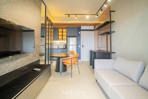 Basic Apartment | Living area | 40-inch TV with digital channels - Apt w/ Balcony & Grill 350m From the sea Vpd0701 (Florianópolis)