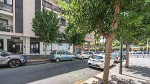 A street view with parked cars, a building with a sign reading 'Edif. EDIMAR IX Portal 3', and a tree in the foreground. - Apartment 'Edimar' with Balcony and Air Conditioning (Benidorm)