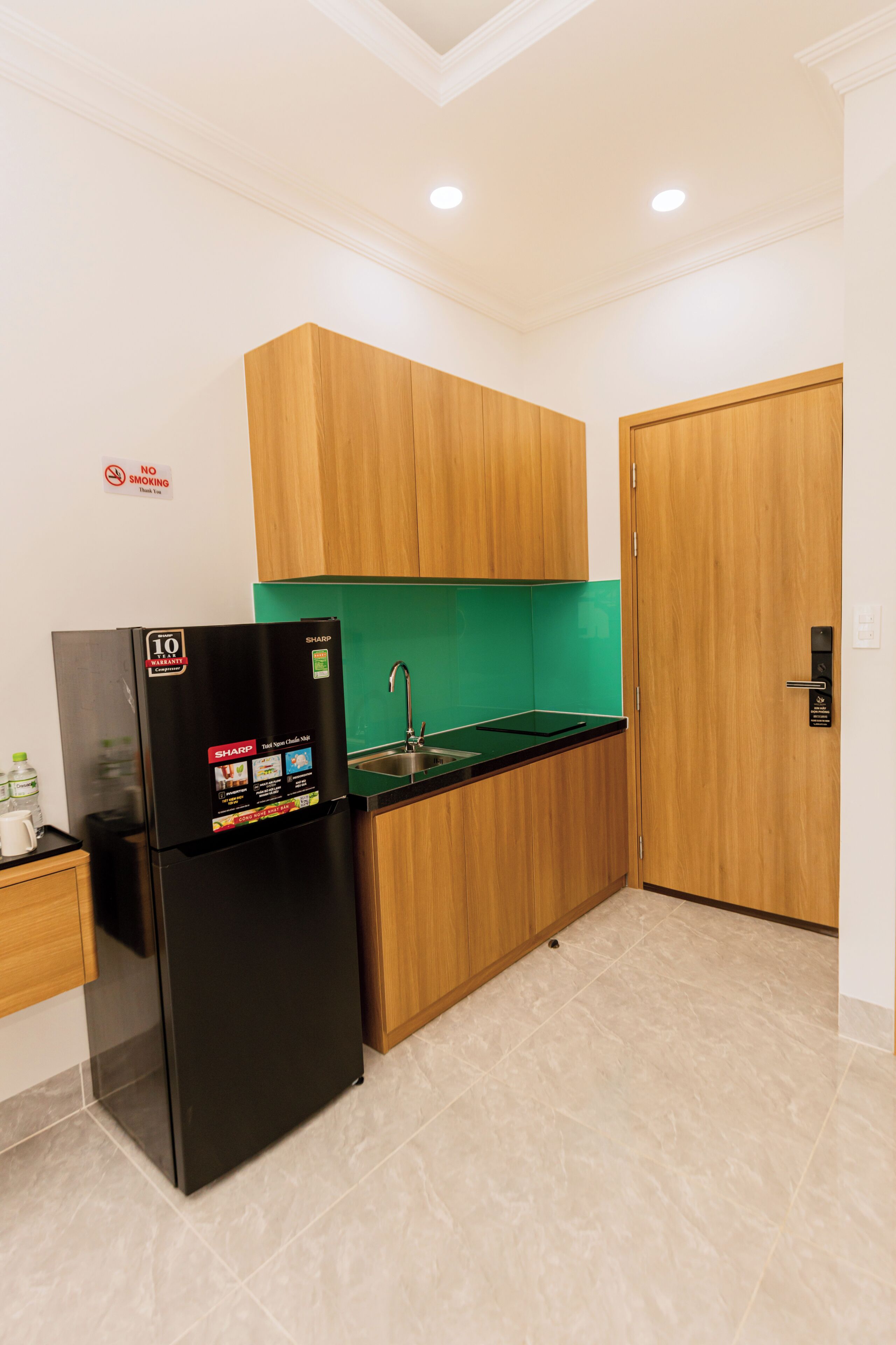 Standard Double Room, Balcony, Courtyard View | Private kitchen | Fridge, stovetop, rice cooker, cookware/dishes/utensils