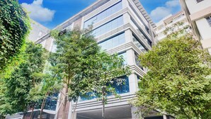 A modern building with multiple floors, large windows, and a flat roof. - Super Collection O Pashan-Sus Road Baner (Pune)