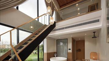 Deluxe Suite, Garden View, Poolside | Premium bedding, desk, laptop workspace, blackout drapes