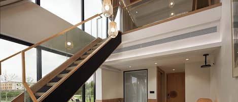 Deluxe Suite, Garden View, Poolside | Premium bedding, desk, laptop workspace, blackout drapes