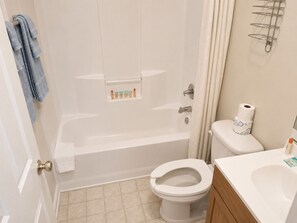 Classic Twin Room, 2 Twin Beds, Non Smoking | Bathroom | Combined shower/tub, towels, soap, shampoo - Tumbleweed Inn & Suites (Alexander)