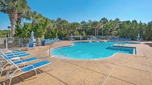 A swimming pool with blue lounge chairs and umbrellas, surrounded by palm trees and a clear sky. - Summit 0908A Romantic Gulf-View Studio at TOPS'L Resort (Miramar Beach)