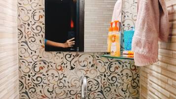 Shower, bidet, towels, soap