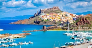 Marina - Holiday home 100 m from the beach with private terrace, balcony, and air conditioning (Lu Bagnu)