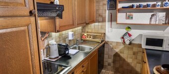 Spacious apartment, 2 minutes from Tsaumiau, with a terrace