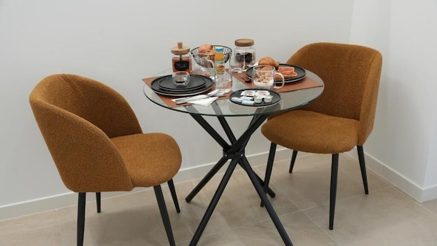 Habitación doble Deluxe, patio, vista al patio | Restaurantes