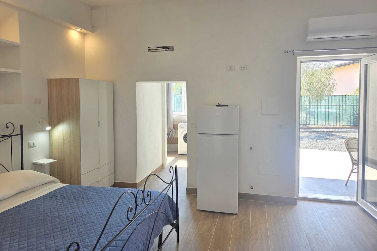 Suite Junior, aria condizionata, vista cortile | Lenzuola