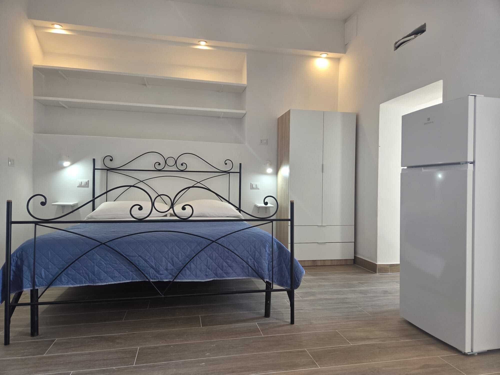 Suite Junior, aria condizionata, vista cortile | Lenzuola