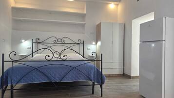Suite Junior, aria condizionata, vista cortile | Lenzuola