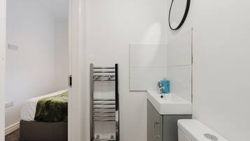 Hair dryer, towels, soap, toilet paper