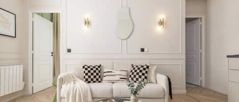 Una sala moderna con un sofá, una mesa de centro e iluminación en la pared.